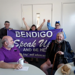 Picture of the Bendigo have a say committee holding Speak Up banner