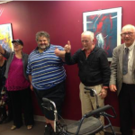 Some of the members from the Our Voice committee doing thumbs up