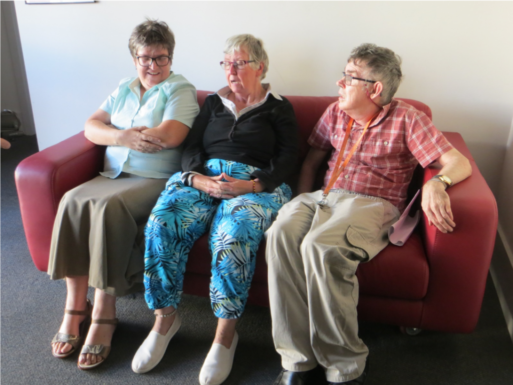picture of Self Advocacy Western Australia committee members sitting on a couch together